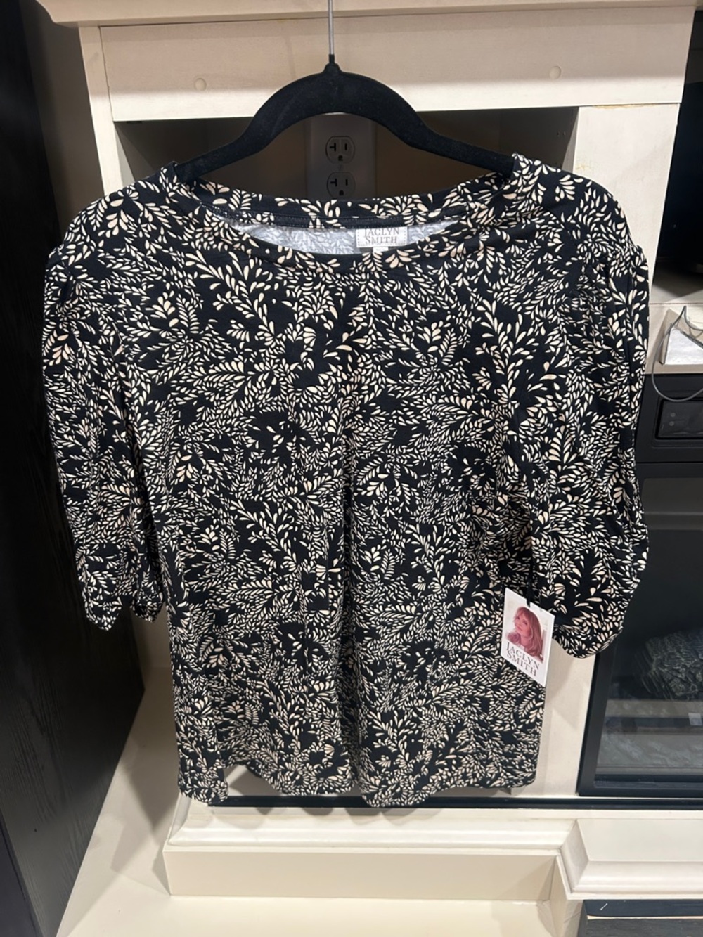 Jaclyn Smith Black Top with Cream Leaf Print